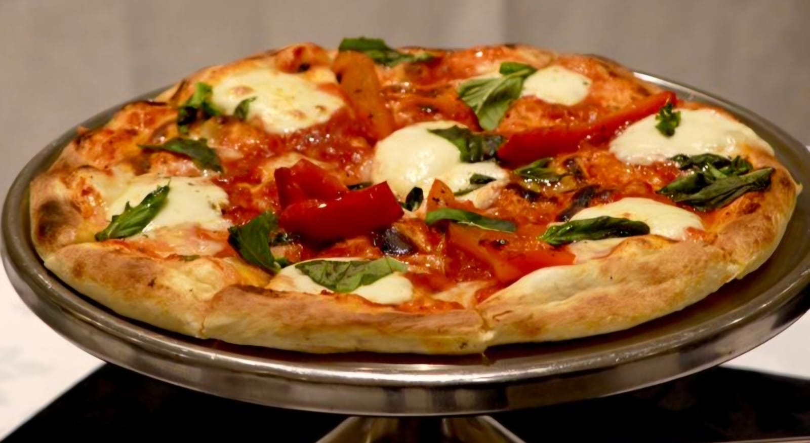 Specialty Margherita — Mozzarella, fresh mozzarella, crushed tomato, fresh basil