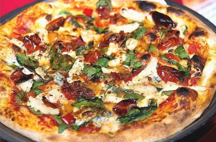 Hot Honey Garlic Chicken — Mozzarella, grilled chicken, hot honey, red onions, hot banana peppers, roasted garlic