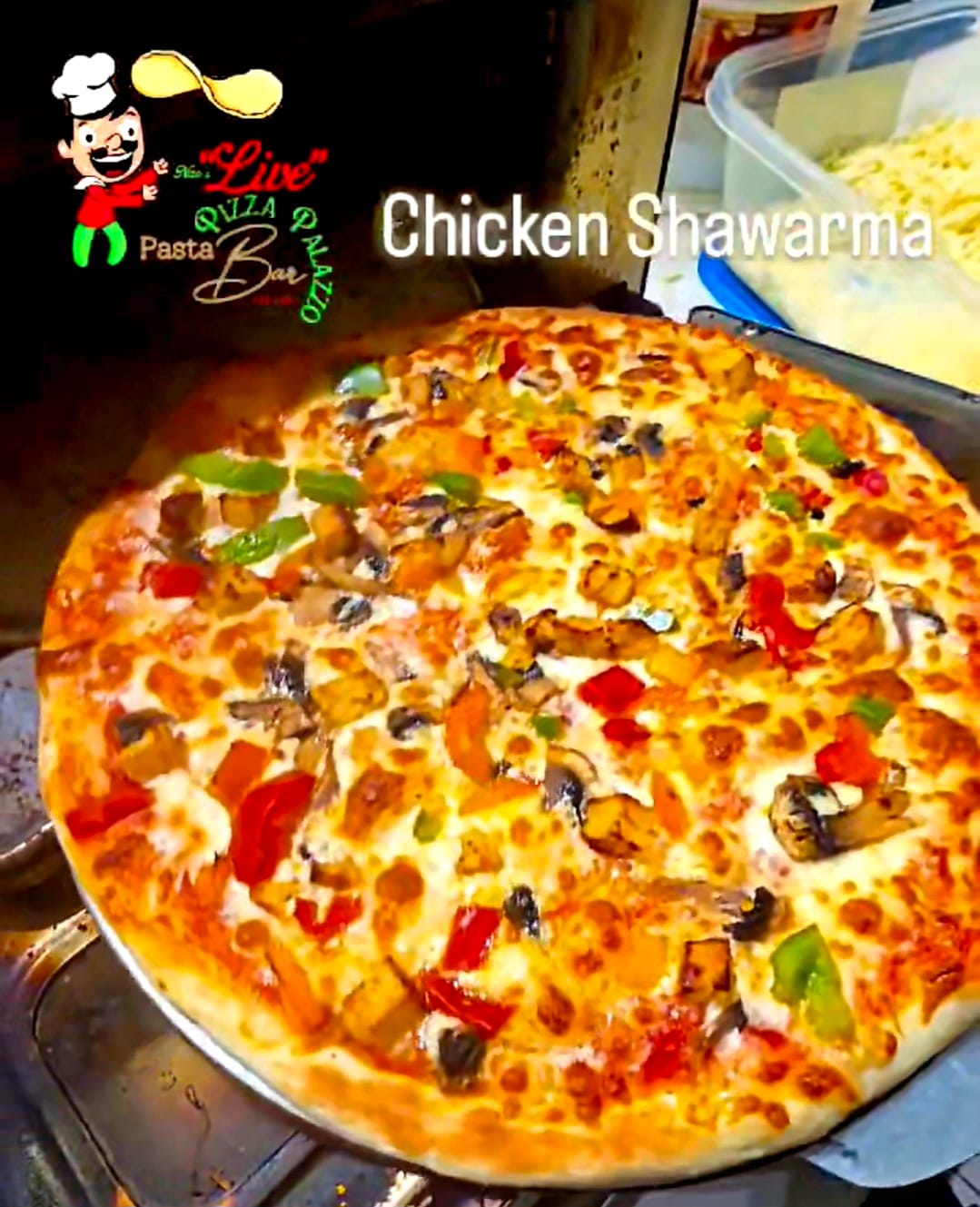 Signature Chicken Shawarma — Mozzarella, chicken shawarma, garlic sauce, red onions, cherry tomatoes, hot sauce
